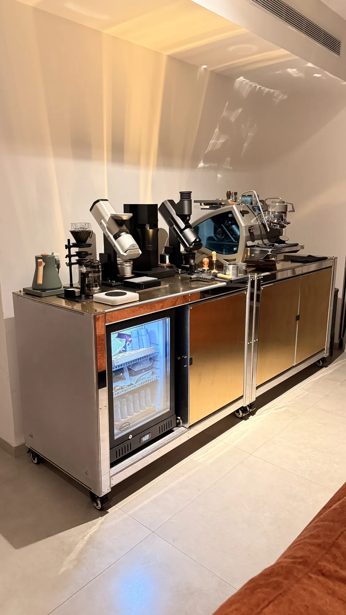 Cube Coffee — Two cubes on castors under a copper counter — a bar that rolls to where the coffee is wanted.