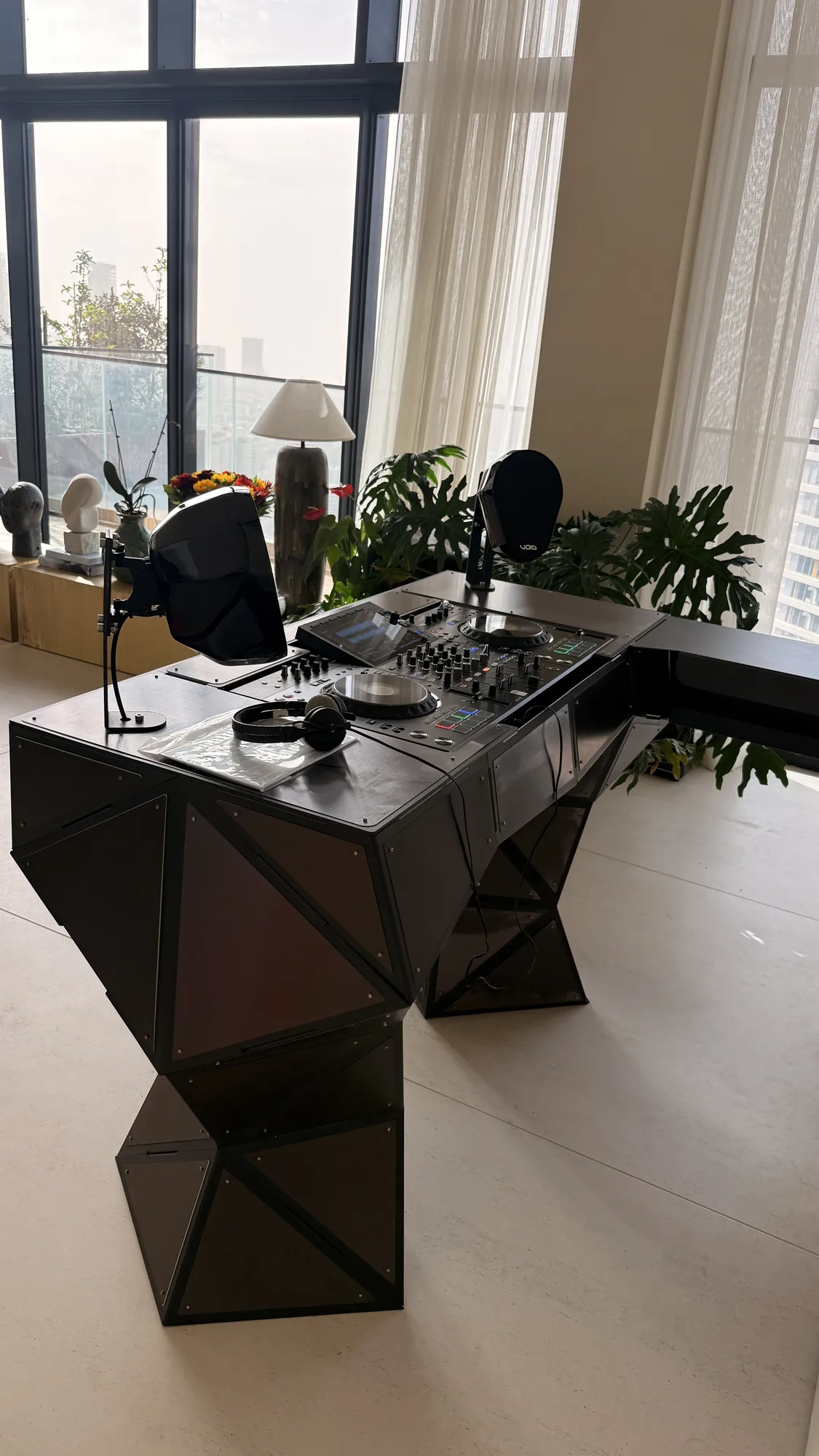 Tri Pi — A faceted station around the Pioneer XDJ-AZ — every crease takes its own light.