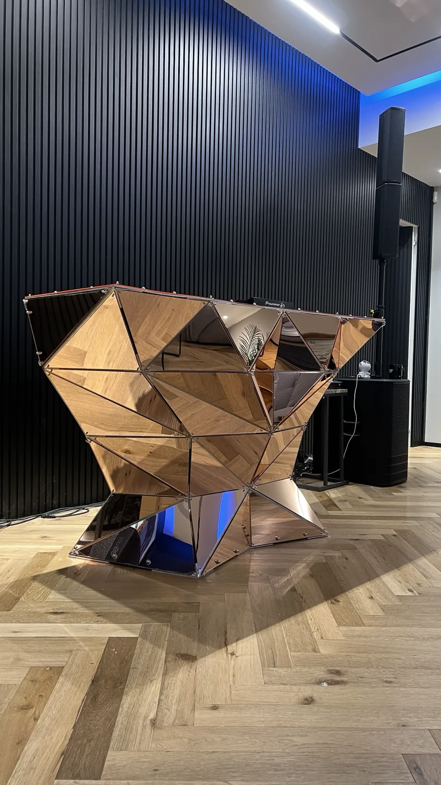 Tri Rose — A mechanical bloom — bolted frame, petal cladding, built around the XDJ-RX3.